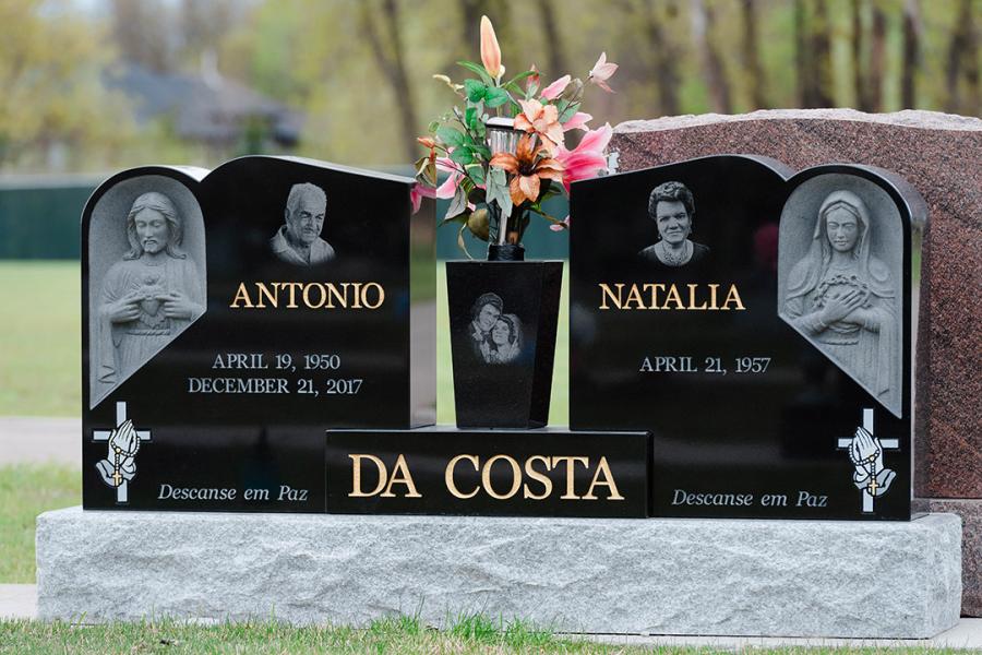 Da Costa, Midnight Black custom design sculptured Jesus & Mary wing memorial installed in Assumption cemetery