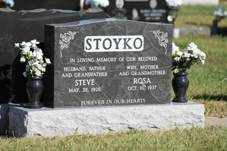 Stoyko, Traditional Style Monument in Jet Mist granite on a standard Galaxy Grey base. Customizations to this memorial are all sides polished and Midnight Black granite vases. 