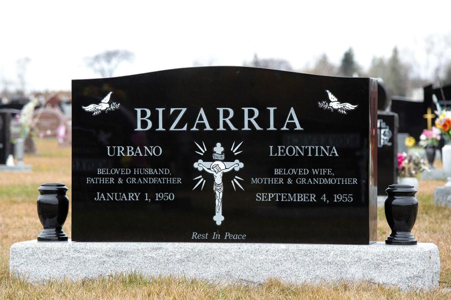 Bizaria, a traditional style Midnight Black Double Memorial on a Galaxy Grey base with two matching granite vases. All designs are sandblasted. 