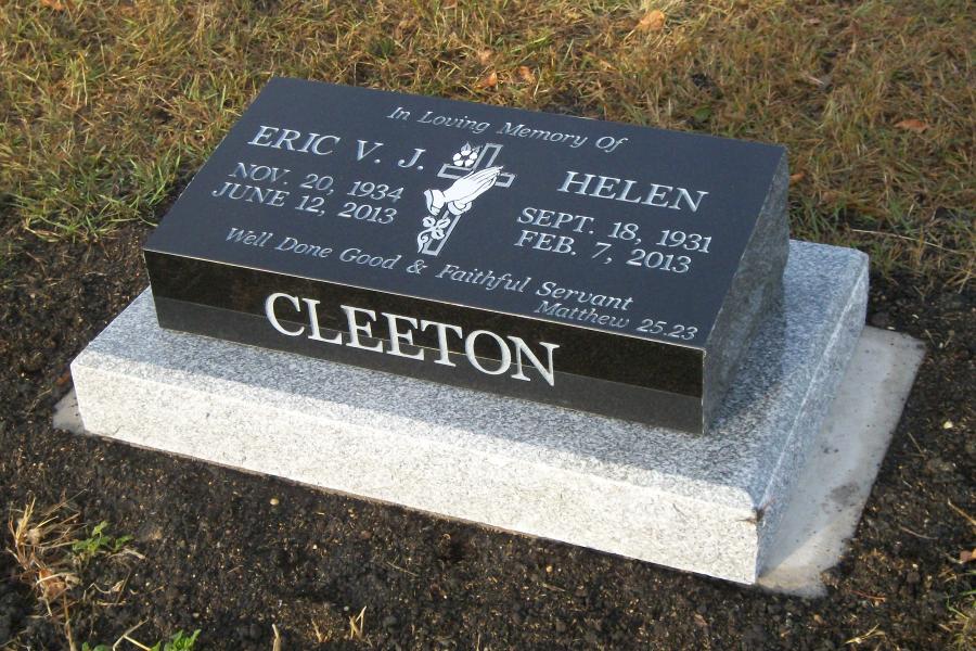 Cleeton, where no cement strip or existing foundation exists, our company will install a granite foundation over a cement foundation for it's durability and strength. Pictured here is a Pillow marker with 3 sides polished, atop a galaxy grey base and a granite foundation. The memorial is customized with the family name on the front and back face of the memorial.  