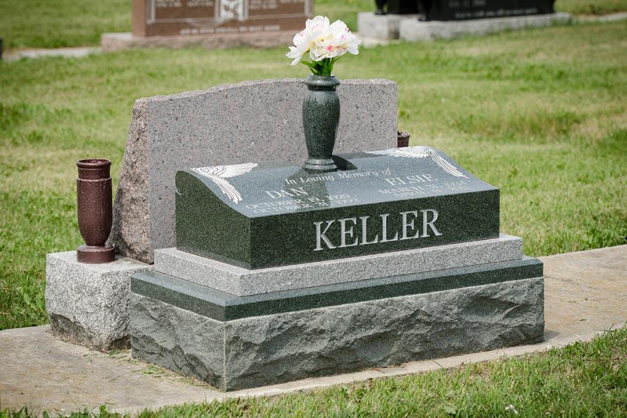 Keller, a custom designed scrolled pillow marker with a Galaxy Grey sub base installed on a matching granite base.