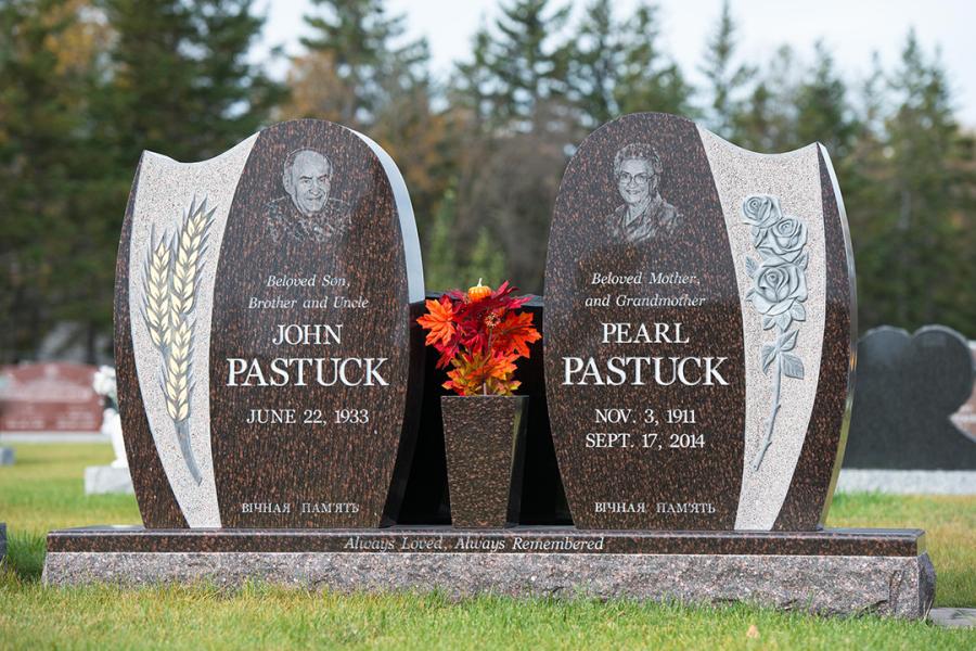Pastuk, Cats Eye brown custom wing memorial in Holy Family cemetery 