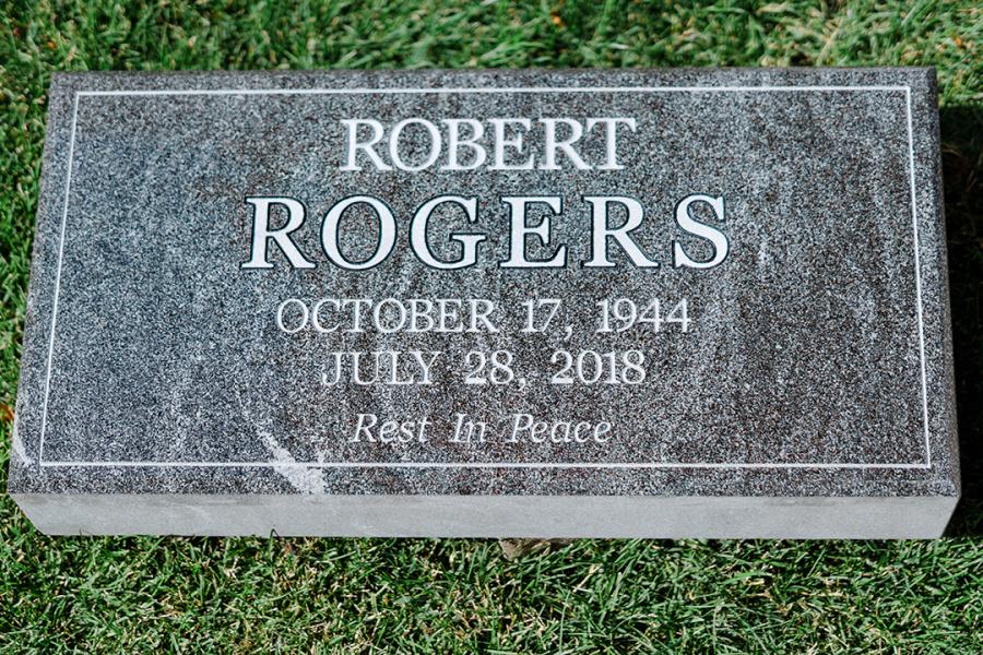 Rogers, a 20 x 10 x 4 Jet Mist flat grass granite marker. Simple in design and aesthetic, this beautiful colour granite is in the mid-range investment and is  maintenance-free option. 