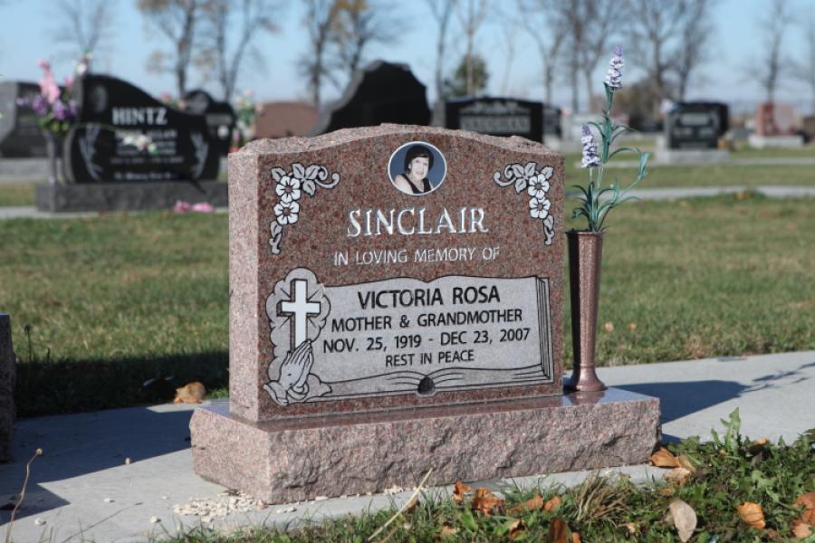 Sinclair, Regal Rose traditional monument installed in Brookside cemetery. 
