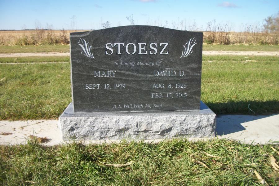 Stoesz, a Jet Mist traditional style imported double memorial on a Galaxy Grey base