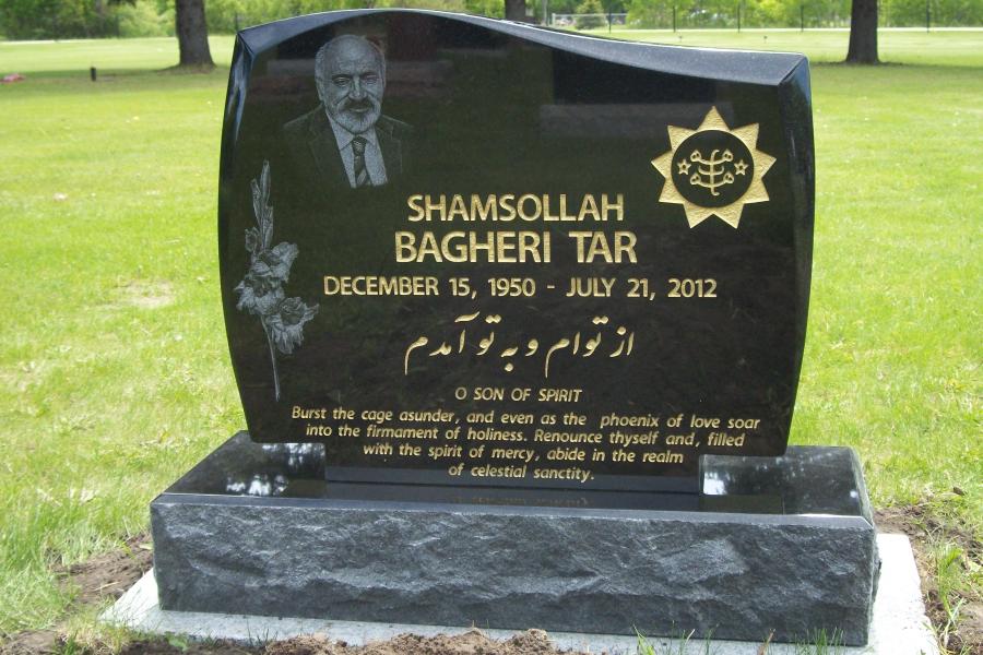 This beautiful custom design Baháʼí Midnight Black memorial can be found in the St. Clements Cemetery in Selkirk, Manitoba. Customized with gold paint, a Diamond Impact etched portrait, a matching Midnight Black vase and a custom bevel edge. 