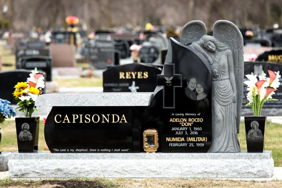 Capisondra, custom design bench & sculptured angel memorial. Customizations include Diamond Impact Etched portraits and religious motifs, bronze lanterns, gold foil paint detailing's and matching vases