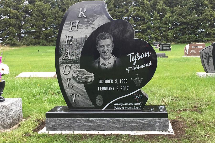 Rehault, This beautiful custom design memorial for a young man gone too soon. Customizations to this memorial include, a matching polish top 2" margin Midnight black base and several custom Impact Etched scenes and portrait. 