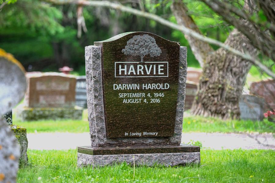 Harvie, Cats Eye Brown custom design memorial installed in the Lake of the Woods cemetery, Kenora, Ontario