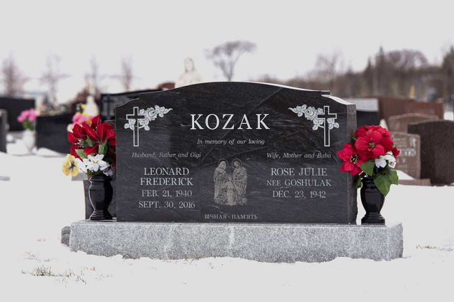 Kozak, Jet Mist traditional double memorial installed in Holy Family cemetery.