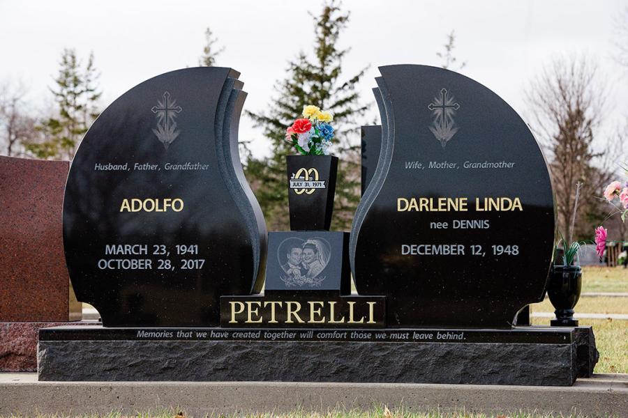 Petrelli, Midnight Black custom design winged memorial installed in Glen Eden cemetery.