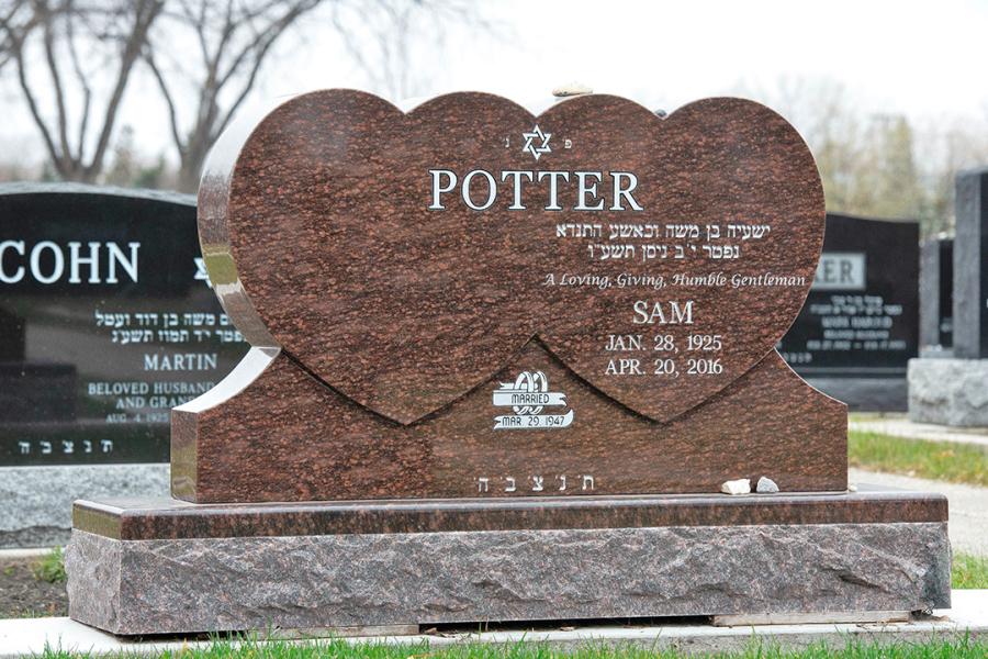 Potter, Cats Eye Red double heart memorial installed in Shaarey-Zedek cemetery