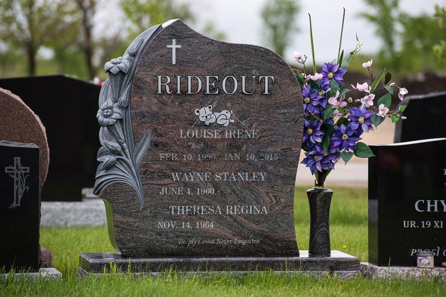 Rideout, Paradiso custom sculptured lily teardrop memorial installed in Holy Ghost cemetery.