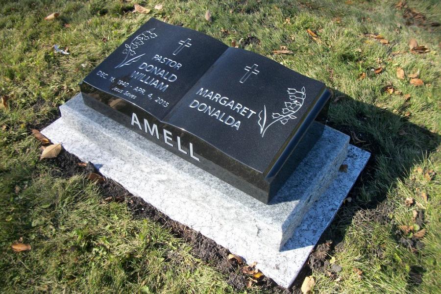 Amell, 30 x 14 x 8/5 Midnight Black book pillow marker installed in Middlechurch cemetery, Middlechurch, Manitoba