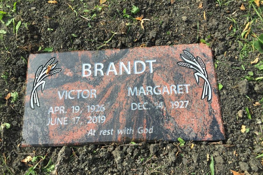 Brandt, 20 x 10 x 4 Aurora flat grass memorial installed in St. Vital cemetery