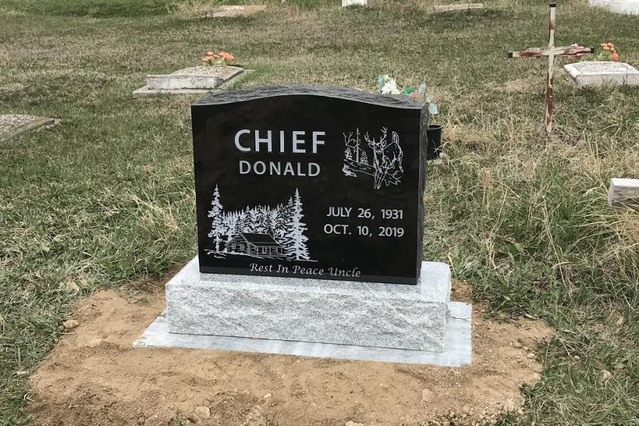 Chief, Midnight black traditional single monument installed in Sapotaweyak Cree Nation Pelican Rapids, Manitoba