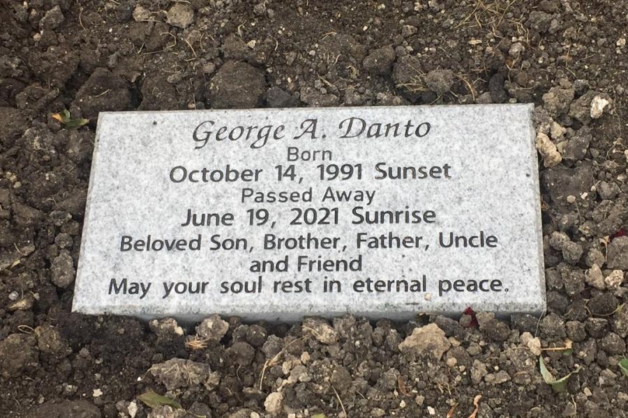 Danto, 16 x 8 x 4 Galaxy Grey flat grass memorial installed in Middlechurch cemetery