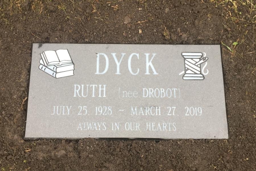 Dyck, 20 x 10 x 4 Midnight Black flat grass memorial installed in Ashbury cemetery