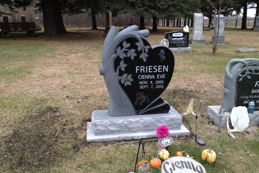 Friesen, Midnight Black custom design sculptured tree installed in Woodville cemetery Kola, Manitoba