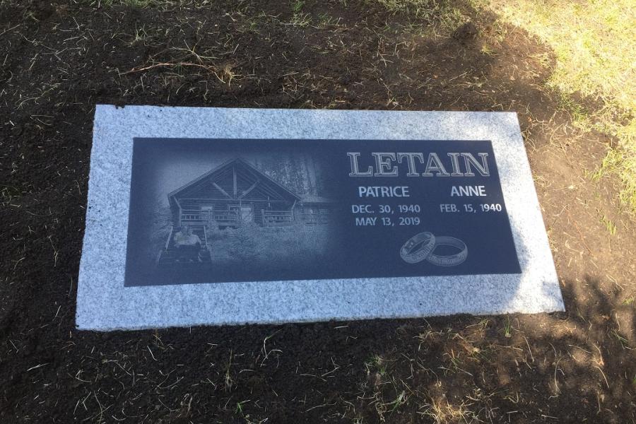Letain, 30 x 18 x 4 Galaxy grey with a 24 x 12 Midnight black inset flat grass memorial installed in Riverside cemetery, Dauphin, Manitoba