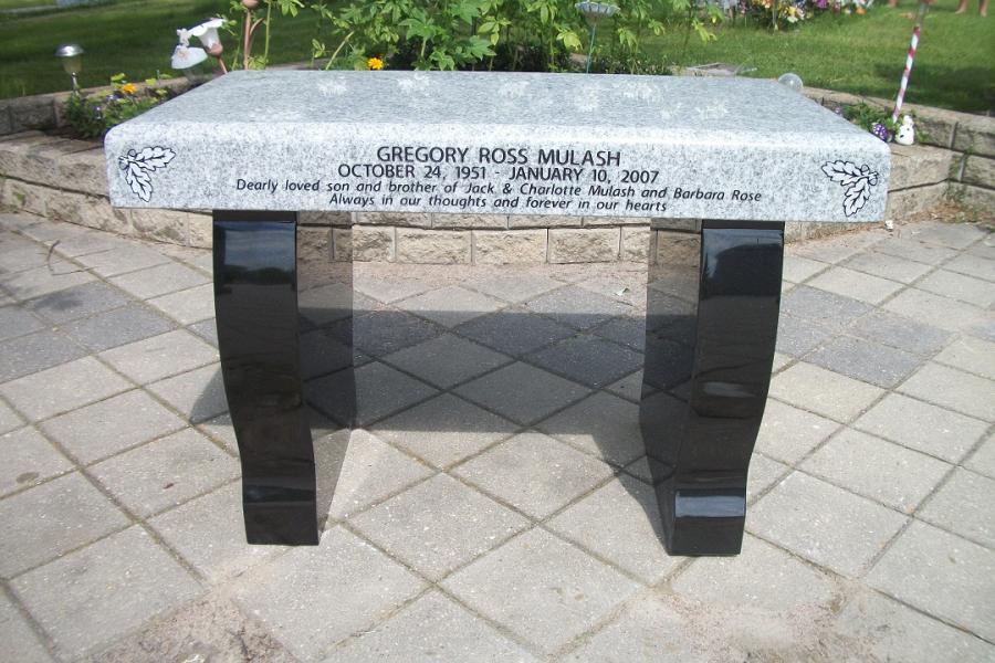 Mulash, Contemporary simple bench installed in Lake of the Woods cemetery Kenora, Ontario