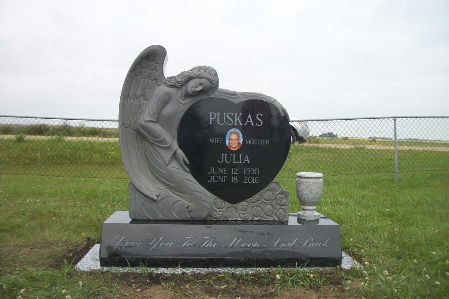 Puskas, Midnight Black custom design sculptured Angel installed in Dumas cemetery Dumas, Saskatchewan