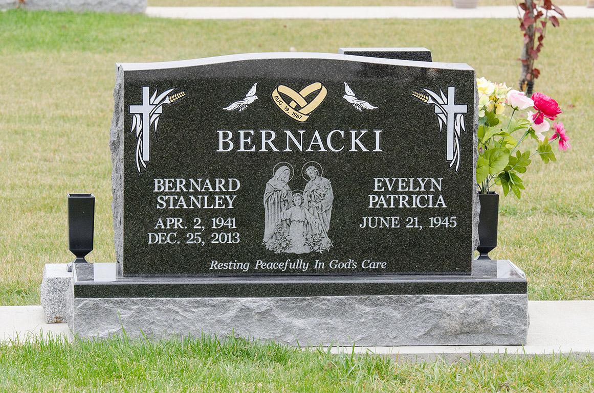 Bernacki memorial completed and Installed. South African Britts Blue memorial customized with gold rings, Diamond Impact etching, and a matching 2" margin base.